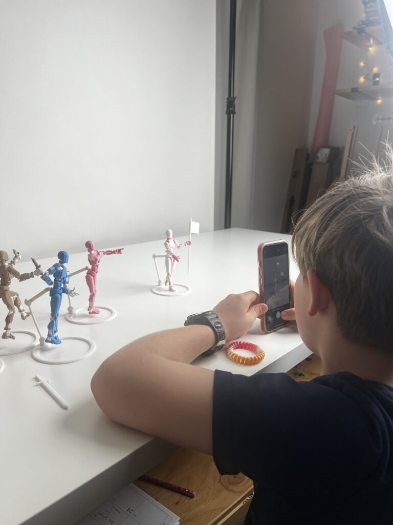 Zoom-in on Phoenix adjusting pose using a phone