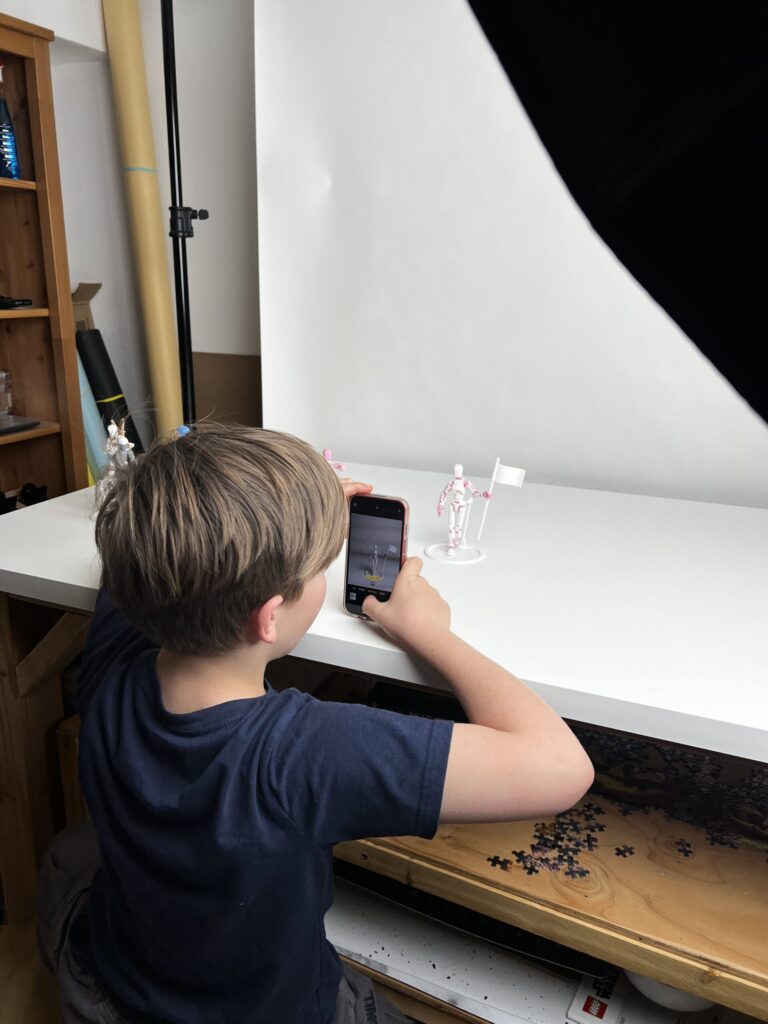 Zoom-in on Phoenix adjusting pose using a phone